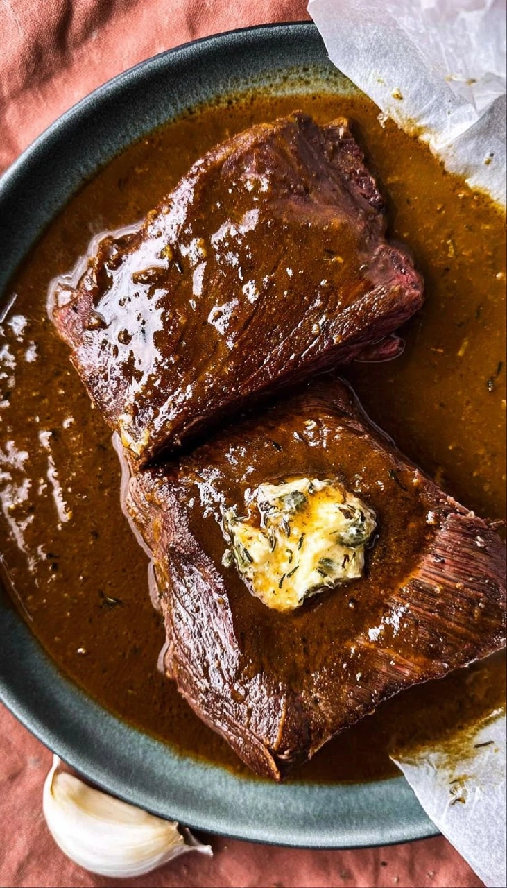 Marinated Venison Steak with Garlic Herb Butter